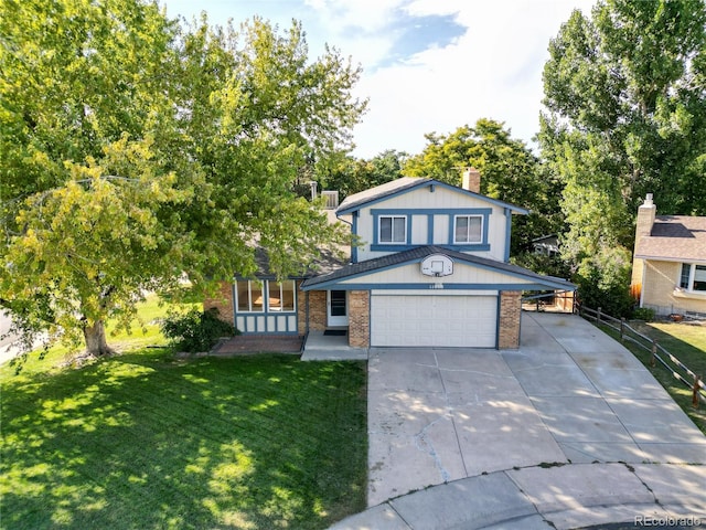 view of front facade with a garage and a front yard