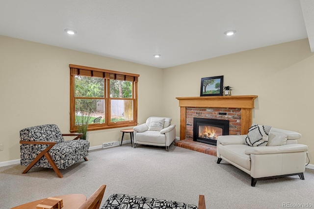 7882 S Valentia Way, Centennial, CO 80112 - living area with carpet, baseboards, a fireplace, and recessed lighting