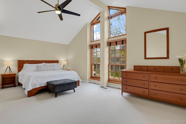 7882 S Valentia Way, Centennial, CO 80112 - bedroom with light carpet, high vaulted ceiling, baseboards, and a ceiling fan