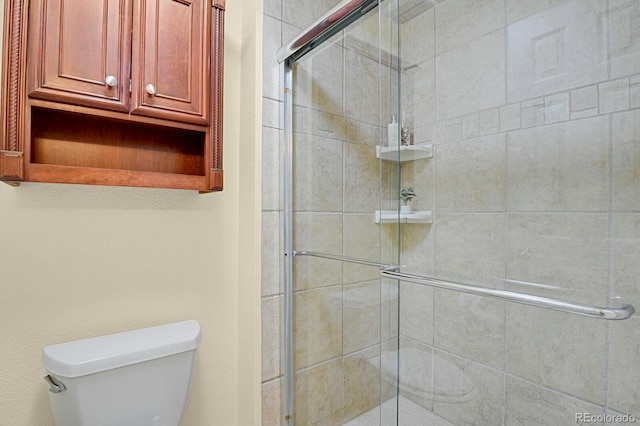 7882 S Valentia Way, Centennial, CO 80112 - bathroom featuring toilet and a shower stall