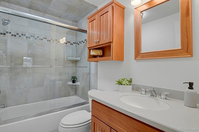 7882 S Valentia Way, Centennial, CO 80112 - bathroom featuring bath / shower combo with glass door, toilet, and vanity