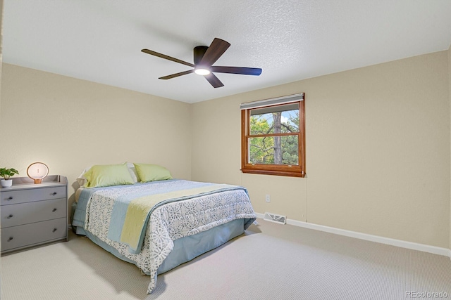 7882 S Valentia Way, Centennial, CO 80112 - bedroom featuring carpet, baseboards, and a ceiling fan