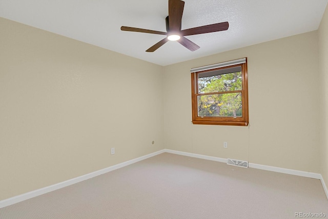7882 S Valentia Way, Centennial, CO 80112 - empty room with light colored carpet, a ceiling fan, and baseboards