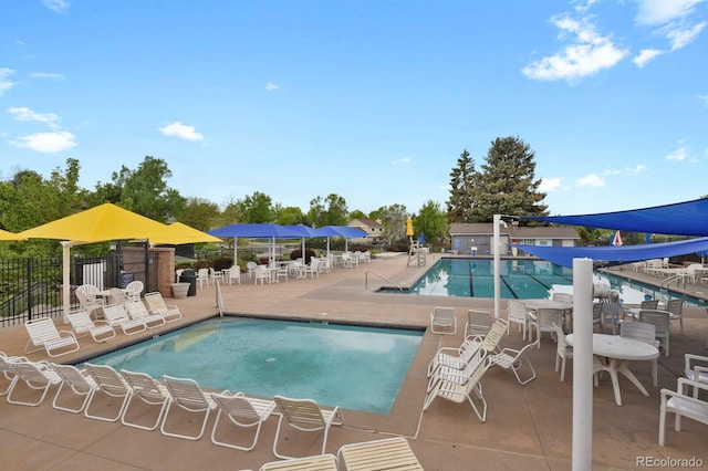 7882 S Valentia Way, Centennial, CO 80112 - community pool featuring a patio