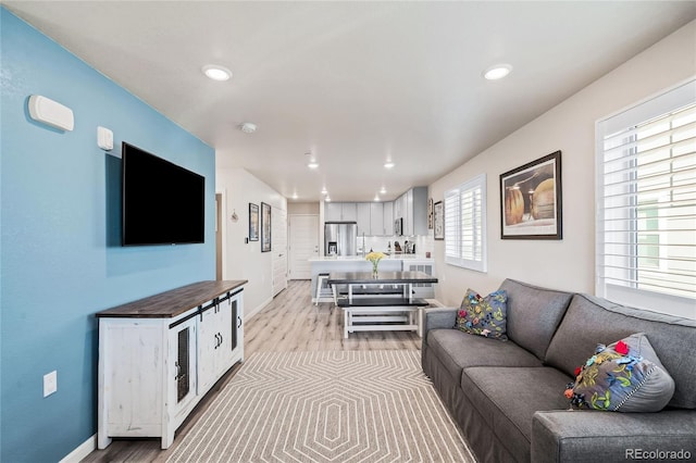 living room featuring plenty of natural light