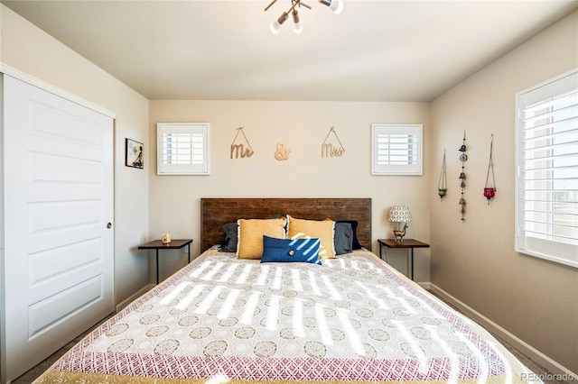 bedroom featuring a chandelier