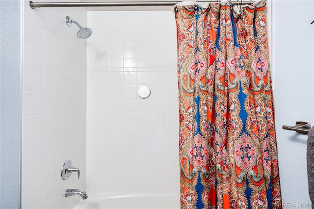 bathroom featuring shower / bath combination with curtain