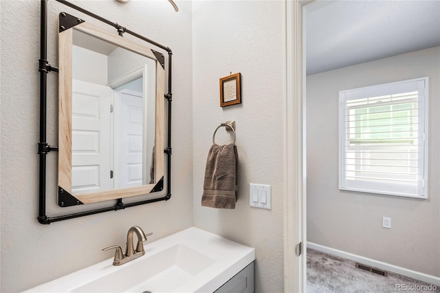 bathroom featuring vanity