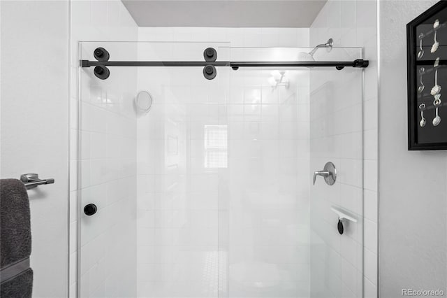 bathroom with an enclosed shower