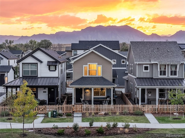 view of front of property with a mountain view