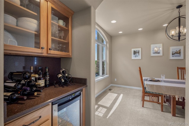 19735 Knights Xing, Monument, CO 80132 - indoor dry bar featuring beverage cooler, light carpet, a chandelier, and recessed lighting