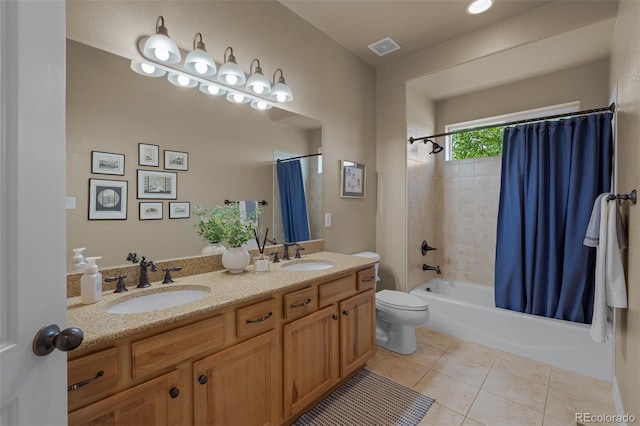 19735 Knights Xing, Monument, CO 80132 - full bath featuring double vanity, shower / tub combo, and tile patterned floors