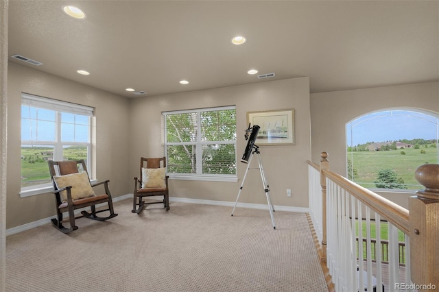 19735 Knights Xing, Monument, CO 80132 - living area with plenty of natural light, recessed lighting, and carpet
