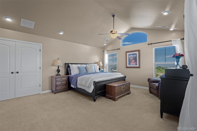 19735 Knights Xing, Monument, CO 80132 - bedroom featuring lofted ceiling, light carpet, ceiling fan, and a closet