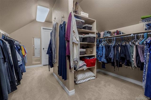 19735 Knights Xing, Monument, CO 80132 - walk in closet with vaulted ceiling and carpet