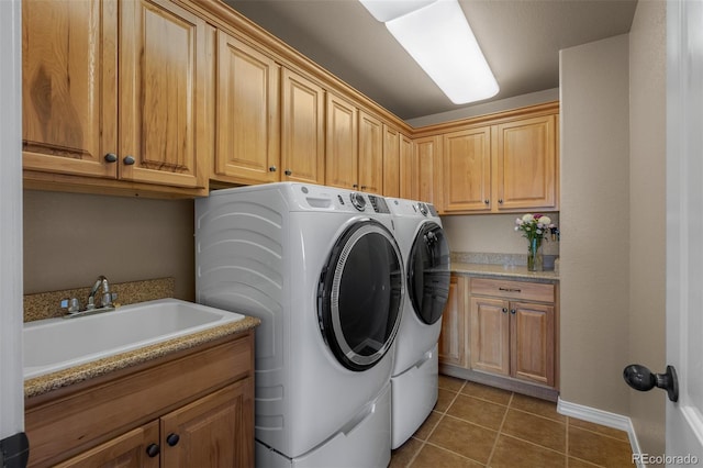 19735 Knights Xing, Monument, CO 80132 - washroom featuring washing machine and dryer, cabinet space, and tile patterned floors