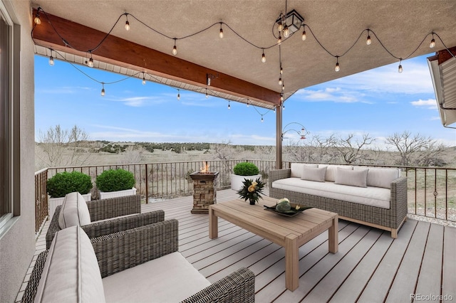 wooden deck with outdoor lounge area