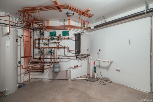 utility room featuring water heater and tankless water heater