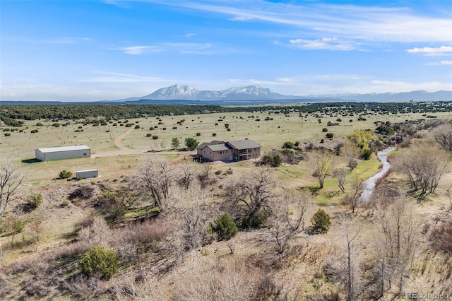 view of mountain feature with a rural view
