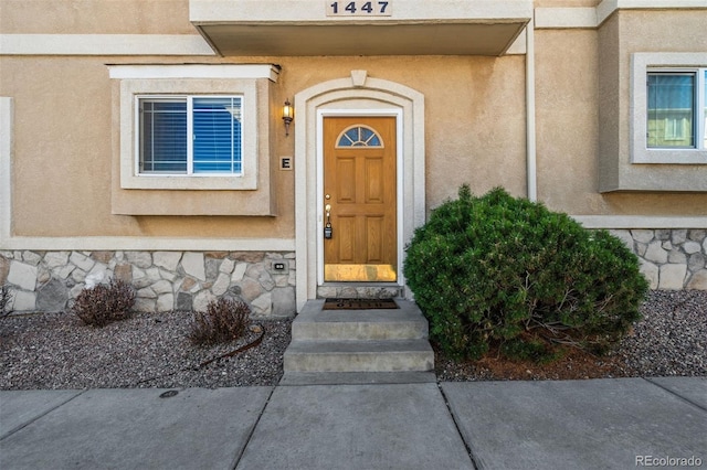 1447 Madison Ridge Hts, Colorado Springs, CO 80904 - entrance to property with stucco siding and stone siding