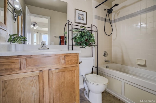 1447 Madison Ridge Hts, Colorado Springs, CO 80904 - bathroom featuring vanity, toilet, washtub / shower combination, and ceiling fan