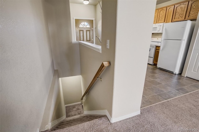 1447 Madison Ridge Hts, Colorado Springs, CO 80904 - stairs with carpet and baseboards