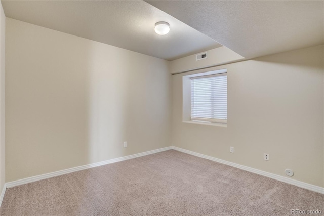 1447 Madison Ridge Hts, Colorado Springs, CO 80904 - carpeted empty room featuring baseboards