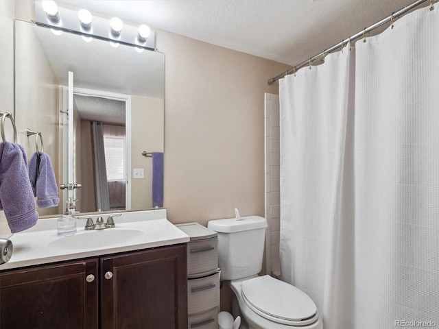 381 S Ames St Unit G101, Lakewood, CO 80226 - full bathroom with vanity, a textured ceiling, and a shower with curtain