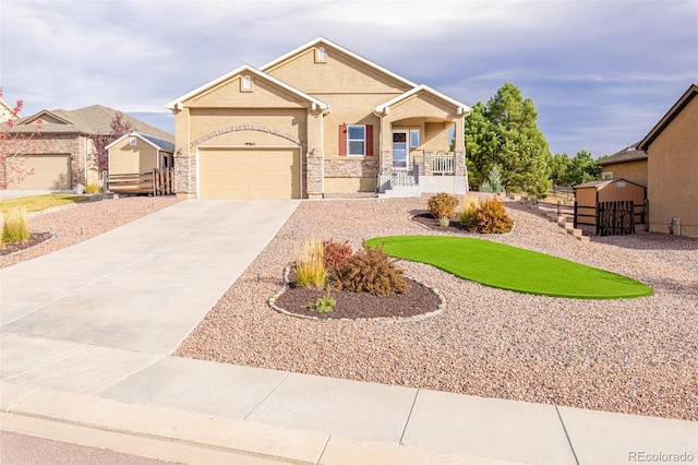 view of front of home with a porch and a garage