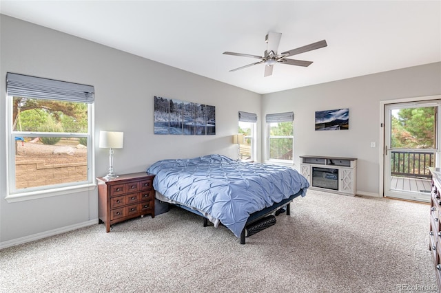 bedroom featuring access to outside, carpet, and ceiling fan