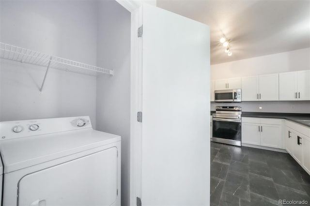 laundry area featuring washer / clothes dryer