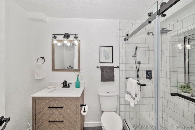 15776 E 107th Way, Commerce City, CO 80022 - full bathroom featuring toilet, vanity, a stall shower, baseboards, and a textured ceiling