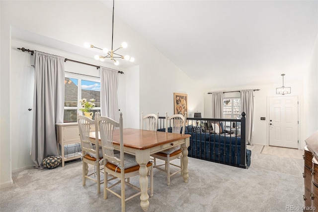 15776 E 107th Way, Commerce City, CO 80022 - dining space with a chandelier, lofted ceiling, plenty of natural light, and carpet flooring