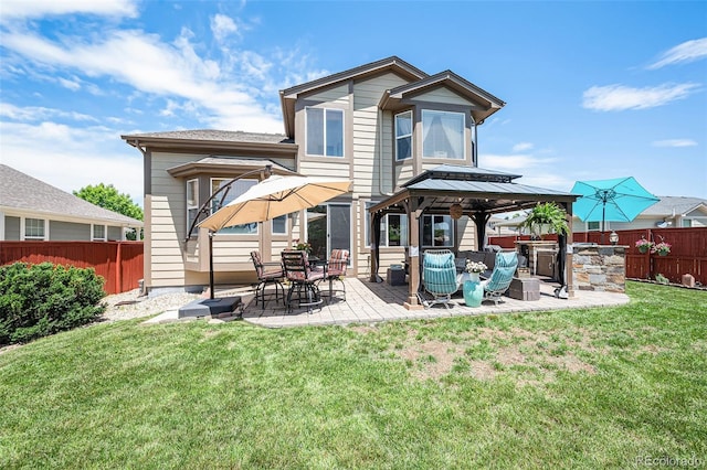 15776 E 107th Way, Commerce City, CO 80022 - rear view of house with a gazebo and a patio area