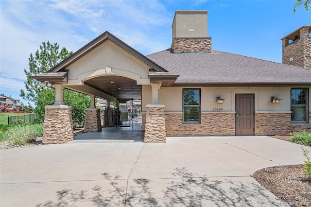 15776 E 107th Way, Commerce City, CO 80022 - view of front of home with stucco siding, roof with shingles, and a chimney