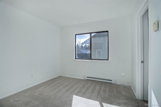 unfurnished room featuring baseboards, baseboard heating, and light colored carpet