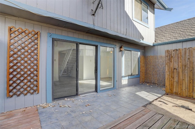 exterior space featuring a patio area and fence