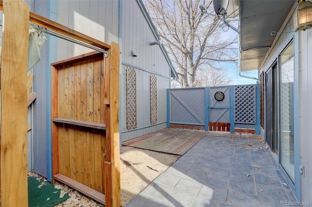 view of patio / terrace featuring a gate