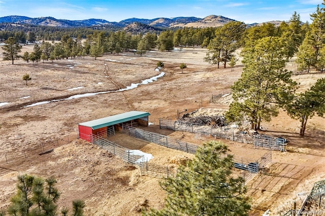 bird's eye view featuring a rural view and a mountain view