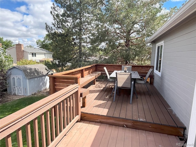 wooden terrace with a storage unit