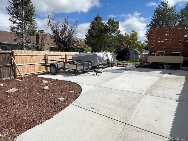 view of patio with a shed