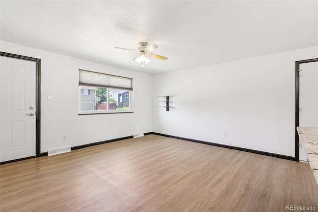 108 Olympus Cir, Lone Tree, CO 80124 - unfurnished room featuring ceiling fan and light wood-style floors