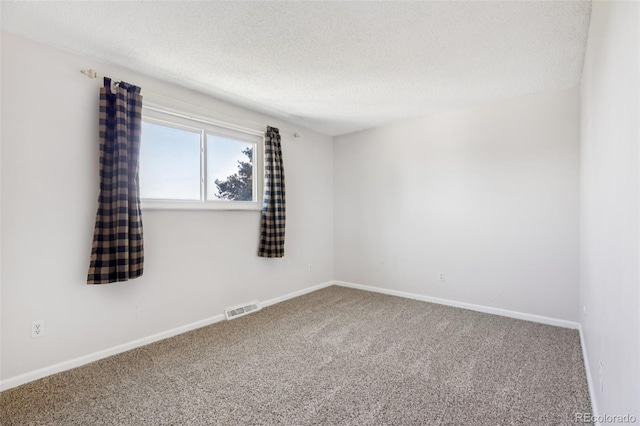 108 Olympus Cir, Lone Tree, CO 80124 - carpeted spare room featuring a textured ceiling and baseboards