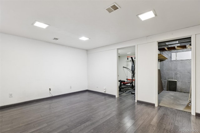 108 Olympus Cir, Lone Tree, CO 80124 - basement with dark wood-style floors and baseboards