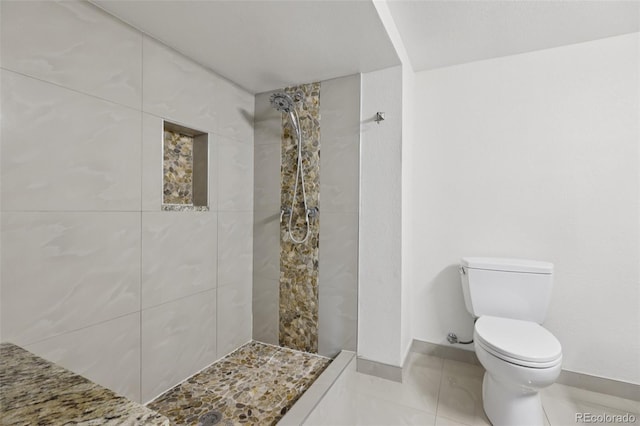 108 Olympus Cir, Lone Tree, CO 80124 - bathroom with tiled shower and tile patterned floors