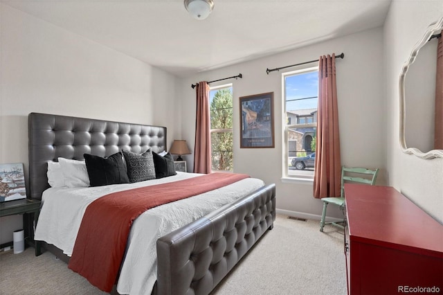 15290 W Baker Ave, Lakewood, CO 80228 - bedroom with light colored carpet and baseboards