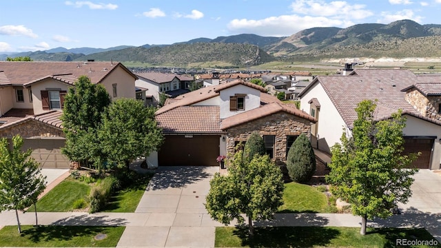 15290 W Baker Ave, Lakewood, CO 80228 - view of mountain backdrop featuring nearby suburban area