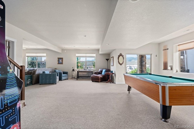 15290 W Baker Ave, Lakewood, CO 80228 - playroom featuring carpet floors, plenty of natural light, pool table, and a textured ceiling