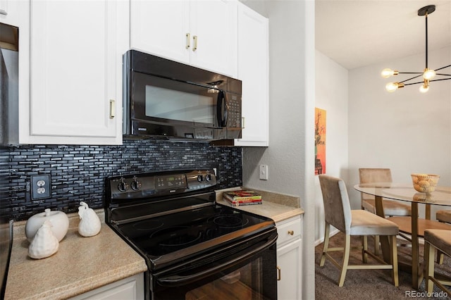 kitchen with white cabinets, black appliances, decorative light fixtures, an inviting chandelier, and tasteful backsplash