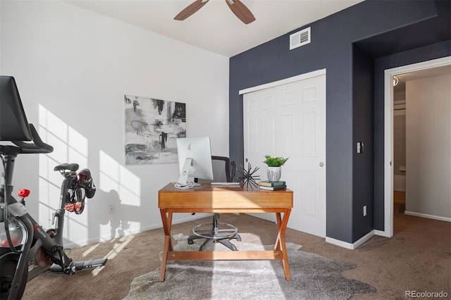 home office with carpet flooring and ceiling fan